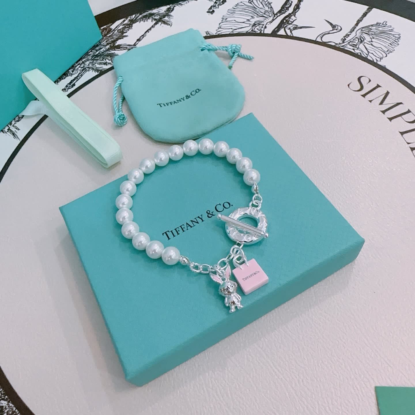 Tiffany & Co. Pearl Bracelet with Toggle Clasp and Charms